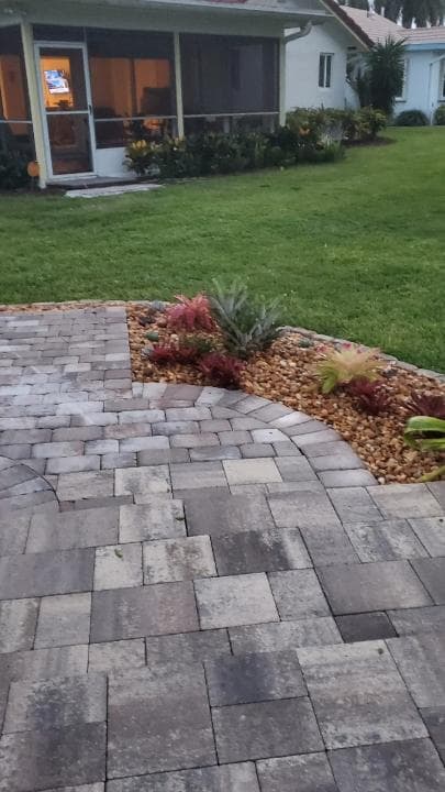 Professional paver sealing service in West Palm Beach by Domi Landscape