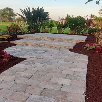 Beautifully landscaped South Florida property by Domi Landscape